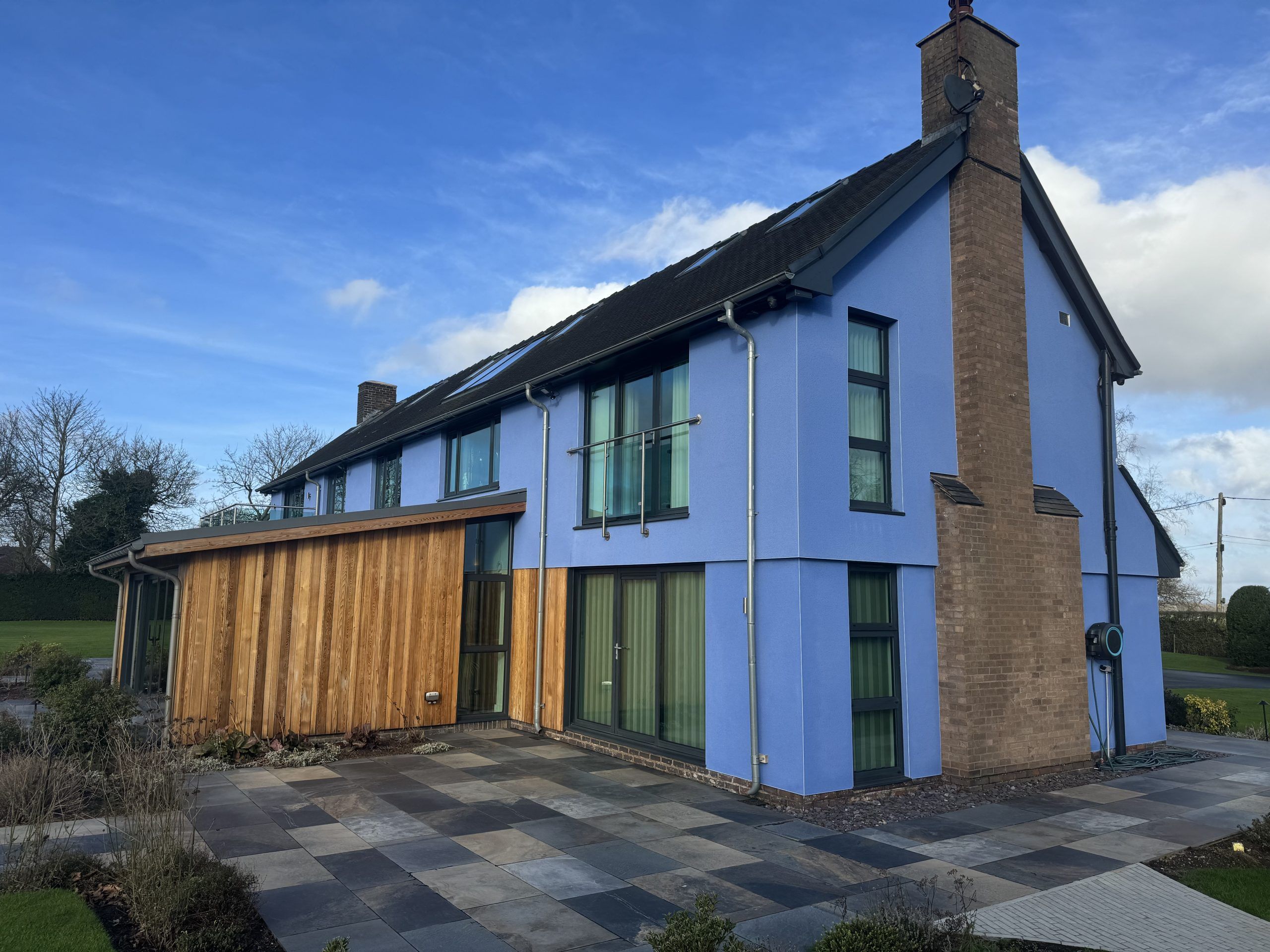 External render being applied to a house in summer by SM Rendering