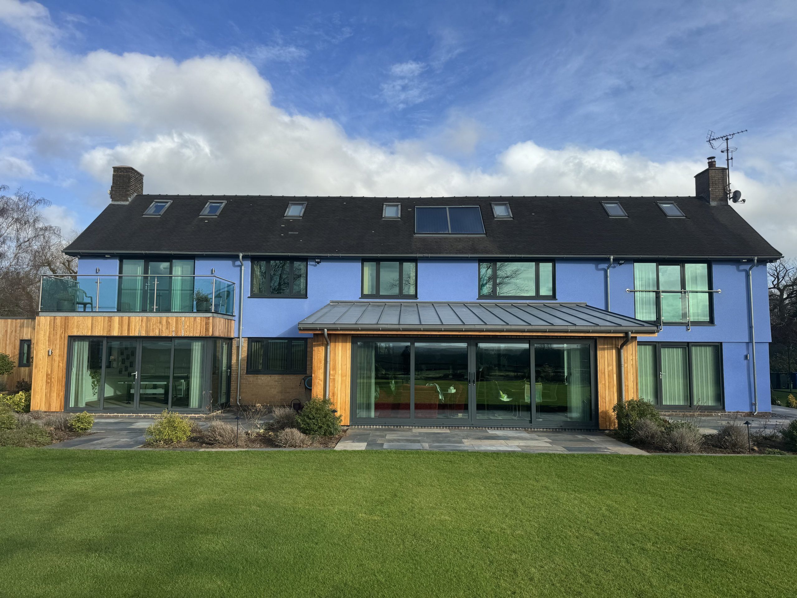 Coloured through-render finish on the exterior of a house by SM Rendering
